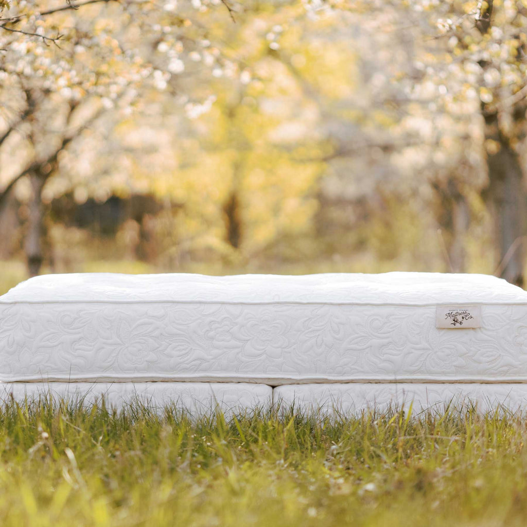 White luxury mattress with vintage fabric in nature.