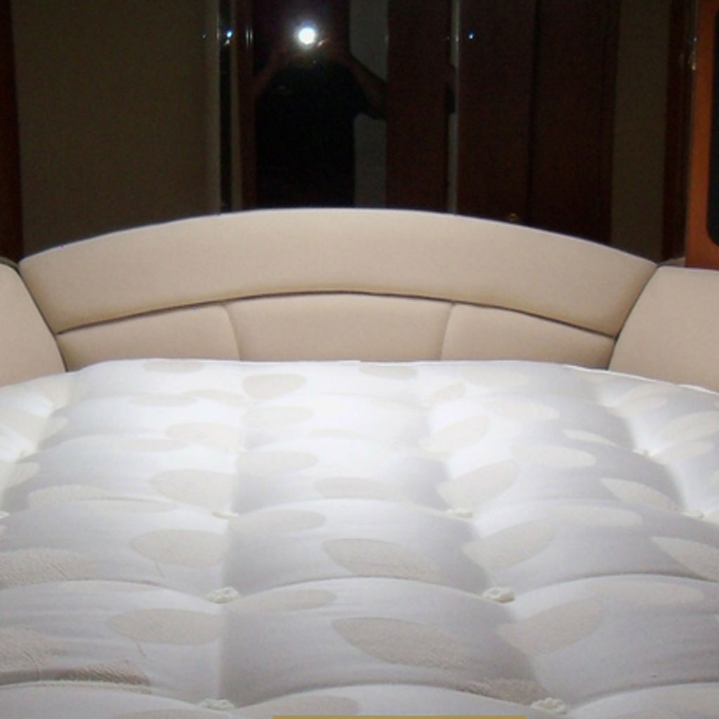Custom made boat mattress inside a boat.