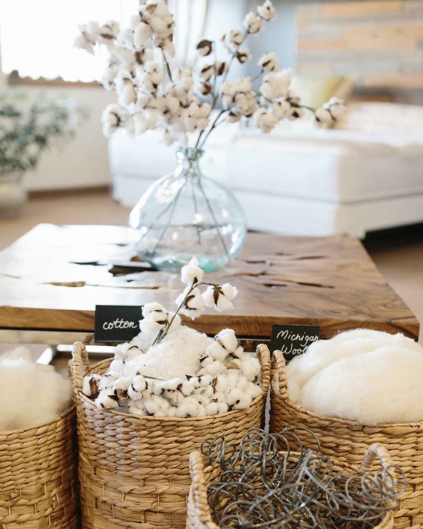 Baskets of natural wool and cotton on display at Harbor Springs Mattress Co store in Harbor Springs, Michigan.
