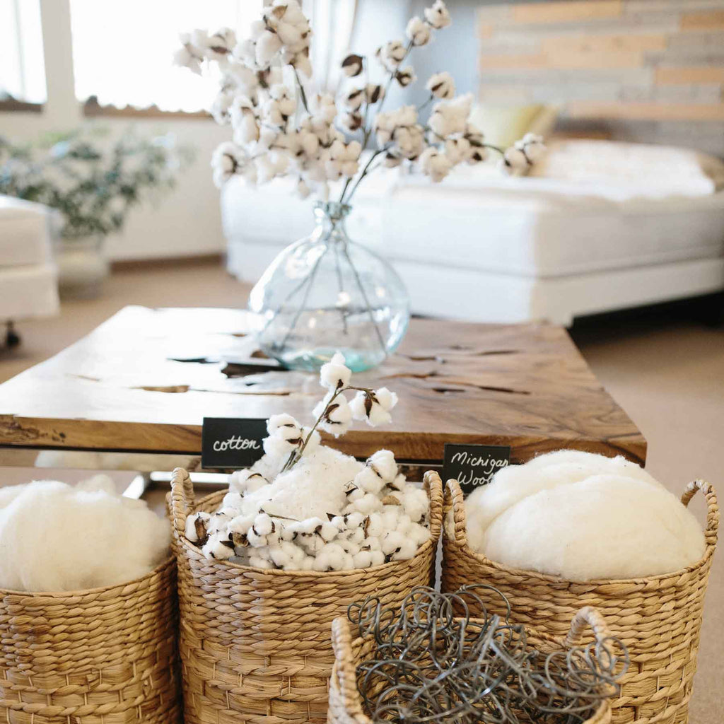 Baskets of natural wool and cotton on display at Harbor Springs Mattress Co store in Harbor Springs, Michigan.